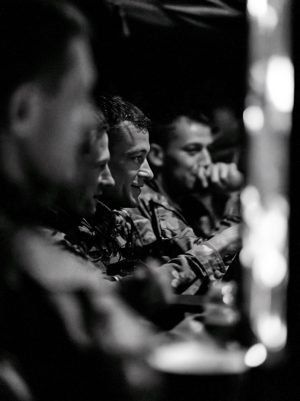 Modern british soldiers watching a television. faceless. anonymous. blurry photo, candid action shot. Smiles. black and white --ar 3:4 --hd --v 8.2 Job ID: cdb12fe2-35d4-407b-bcad-1b80dbcfe484